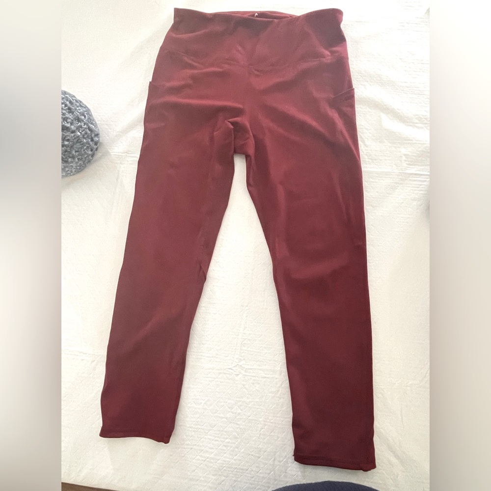 Burgundy Medium Capris by Head.  Inseam 21 inches. A deep Pocket on either side